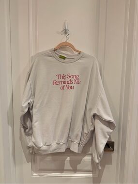 White Crewneck Sweatshirt with Pink Text "This Song Reminds Me of You"